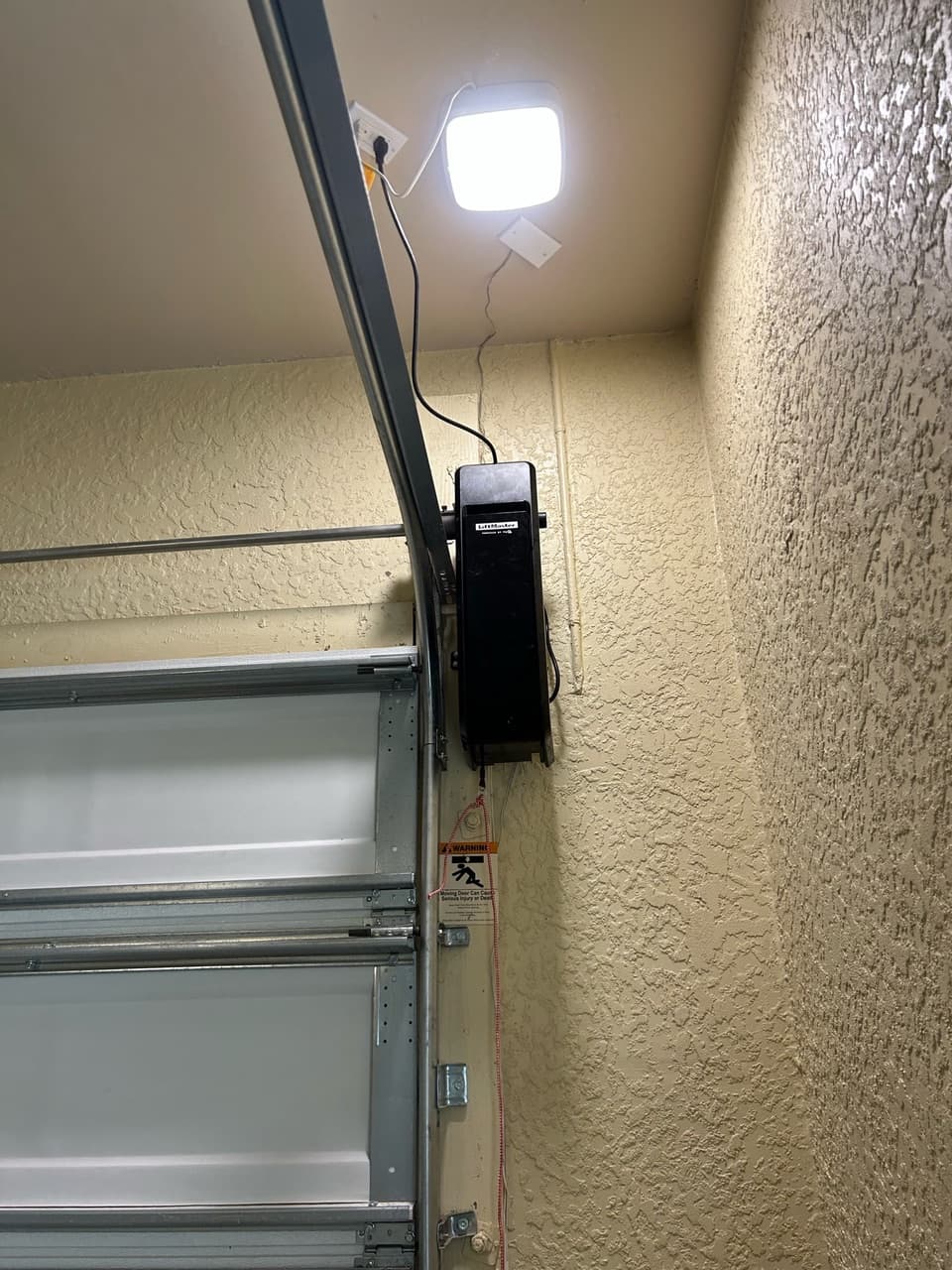 Is Your Garage Door Motor Acting Up? Don’t Get Stuck in the Naples Heat!